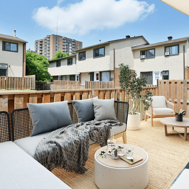 Virtually staged patio at a suite at Navaho Townhomes & Garden Homes.